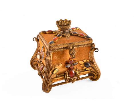 A Victorian ormolu jewelled casket set with oval panels of banded agate, carnelian, with scrolled decoration and urn finial, 
