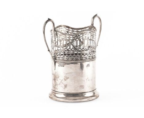 A George V silver bottle coaster, with ornate pierced openwork and foliate decoration, hallmarked for Sheffield 1921 by Willi