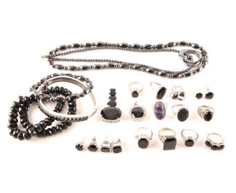 A large collection of silver boi ploi black spinel jewellery, including nine rings, six pairs of earrings, two pendants, two 