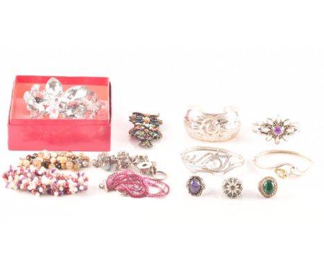 A collection of costume jewellery, including various gem set silver rings, a Butler &amp; Wilson large flower bracelet in box