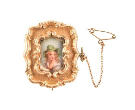 A 19th century brooch, featuring a miniature enamel portrait of a lady surrounded by an ornate yellow gold frame, fitted to r
