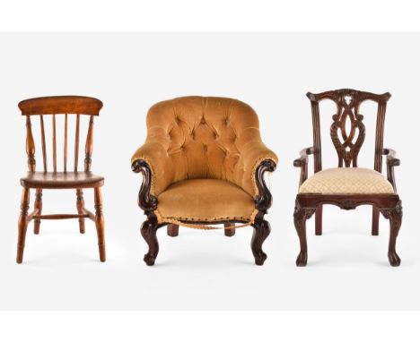 Three miniature dolls chairs, including a Victorian buttont back mahogany tub chair, an elm seated stick back chair, and a Ch