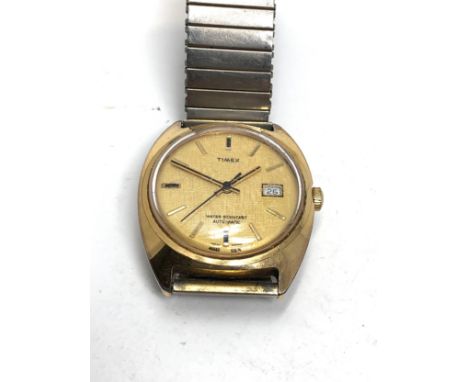 Gents vintage timex automatic wristwatch linen dial the watch does tick but no warranty given 
