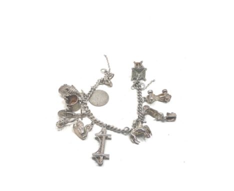 Vintage silver charm bracelet weight 45g no clasp 