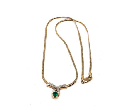 9ct Gold vintage diamond and synthetic emerald static pendant necklace (5.8g) 