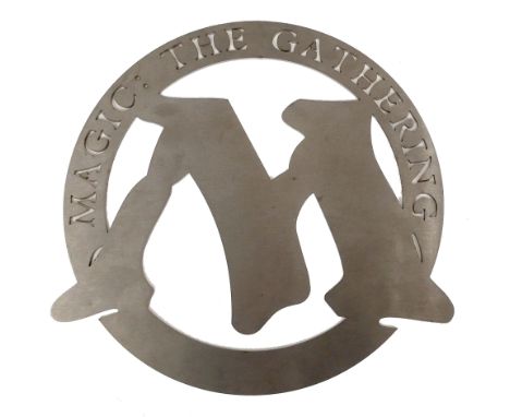 This lot features an incredibly rare Magic the Gathering metal sign that belonged to former Wizard of the Coast manager Julia