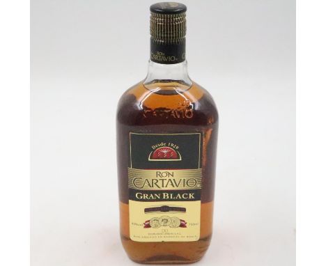 75cl bottle of Ron Cartavio Gran black rum. UK P&amp;P Group 3 (£30+VAT for the first lot and £8+VAT for subsequent lots) 
