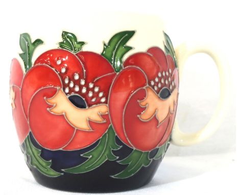 Moorcroft mug in the Meo Voto pattern, H: 9 cm. P&amp;P Group 1 (£14+VAT for the first lot and £1+VAT for subsequent lots)
Co