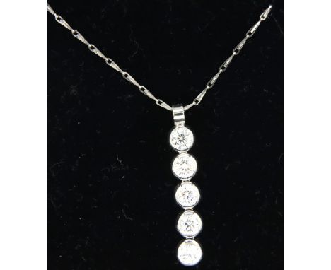 18ct white gold pendant necklace with a five diamond drop total 1.25carats of diamonds, drop: 22 mm, 3.7g, L: 44 cm. P&amp;P 