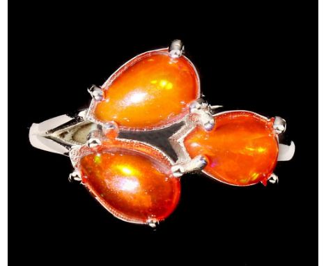 A 925 silver ring set with pear cabochon cut fire opals, (R.5). Condition : very good condition.