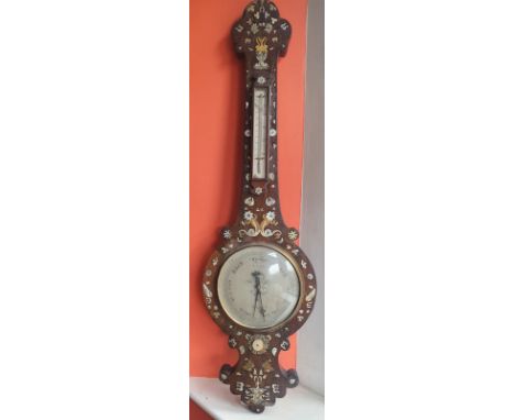 A 19thC inlaid banjo barometer by C. Cetti of Dudley, profusely decorated with flowers, a water fountain inlaid to base, 39" 
