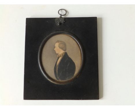19thC School - oval watercolour miniature - Half length male portrait in profile, 3.75" high.