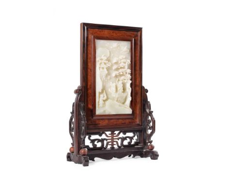 
	
		A Chinese pale celadon jade plaque, Qing Dynasty, 19th century, carved in high relief with a scholar standing on a rock 