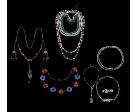 
	
		A collection of six jade and hardstone necklaces, the longest 38.5cm long, and various white metal necklaces
		
		Condit