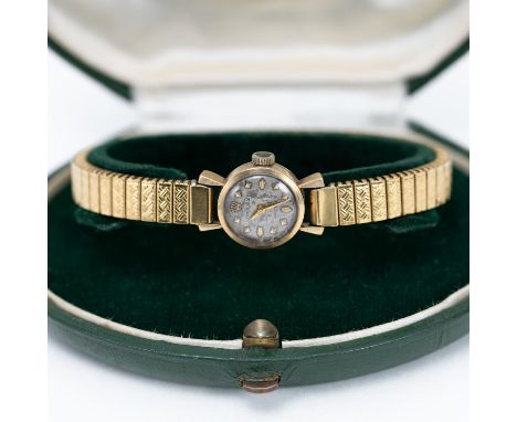 Rolex 9ct yellow gold with original box and Rolex factory service papers dated 1968. The case is 9ct measuring 15mm. It has t