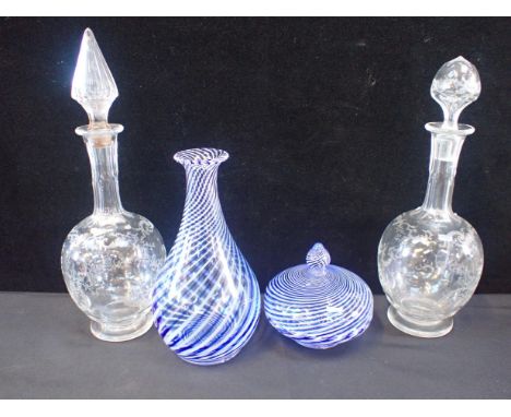 A GLASS CARAFE WITH BLUE AND WHITE SWIRLED STRIPEindistinctly signed 24.5cm high, a similar covered bowl, and two Victorian e