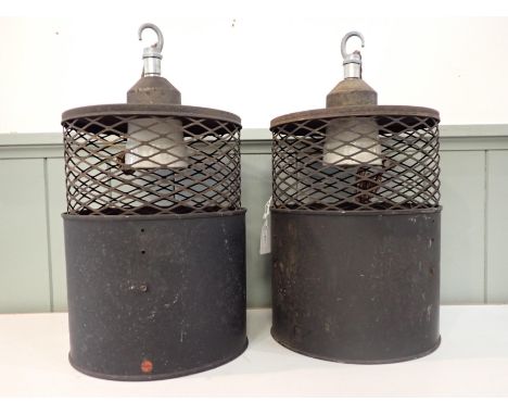 A PAIR OF VINTAGE INDUSTRIAL PENDANT LIGHT FITTINGSwith cage shades and ceramic fittings, each shade 31cm high