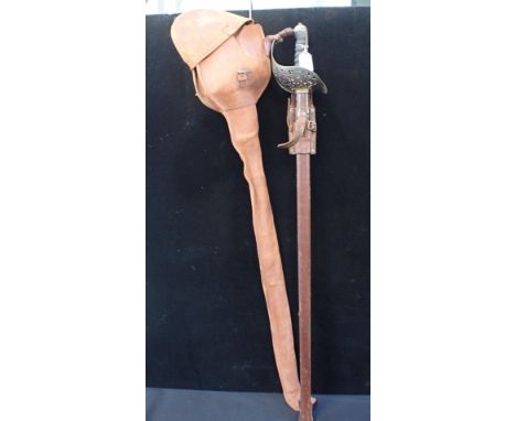 A MILITARY DRESS SWORD, H. LEHMANN, ALDERSHOTGeorge V cipher, in leather sheathNote: You must be over 18 to purchase this ite