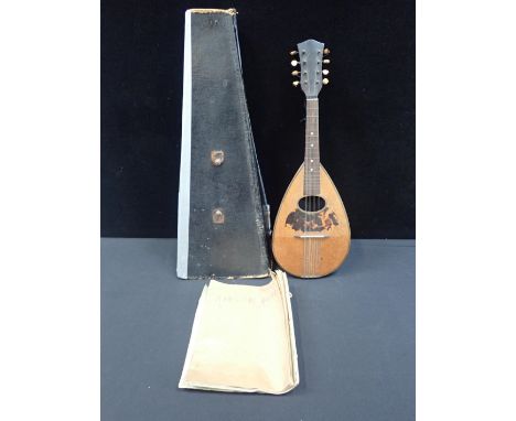 A NEAPOLITAN MANDOLINin case, with instruction manual