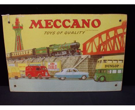 A MECCANO ADVERTISING SHOP CARDwith metal-ringed fixing holes, and Hamley's label 27 x 41cm