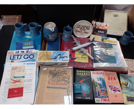 B.O.A.C AIR TRAVEL INTEREST: A COLLECTION OF MEMORABILIAincluding a folder of menus, a tin, Wade ceramic jug and mugs, a diec