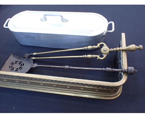 A 19th CENTURY BRASS FENDER,  BRASS TONGSa steel shovel, and a large aluminium fish kettle