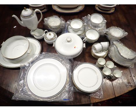 WEDGWOOD:  A 'ULANDER'  DINNER SERVICE, FOR SIXincluding coffee pot etc, some unused in wrapping bags (dish lid a/f)