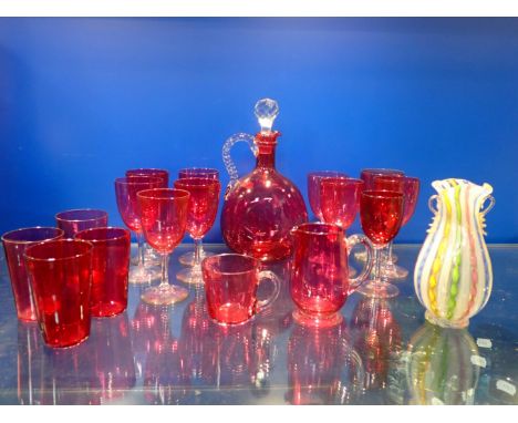 TEN MATCHED CRANBERRY WINE GLASSESwith clear stems, with a decanter, jug, tumblers and a Latticino glass vase (18)