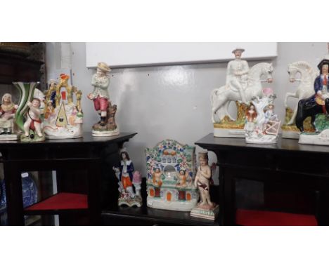 A LARGE 19th CENTURY STAFFORDSHIRE WATCH HOLDERof castle form with cherubs, a square-based Staffordshire cherub candlestick, 