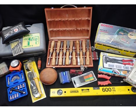 A BOXED SET OF CARVING CHISELSa Bosch CB 420-E drill (untested), and other tools