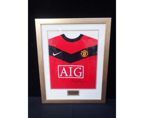 'WAYNE ROONEY' SIGNED FRAMED SHIRTA replica Manchester United shirt hand signed by 'Wayne Rooney', with certificate of authen