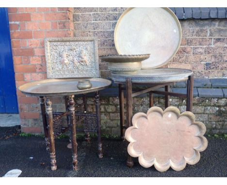 A BRASS-TOPPED TABLE WITH MASHRABAIYA WORK BASEa brass-topped 'Mosq' card table, and other Eastern brass ware