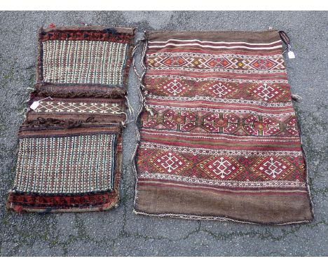 A TURKISH BERGAMA CHUVAL BAG83 x 108cm and a Baluch saddle bag