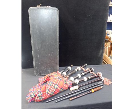 A SET OF CASED 20TH CENTURY BAGPIPES in turned darkwood and white metal furrules, moulded soles, no makers mark, in case