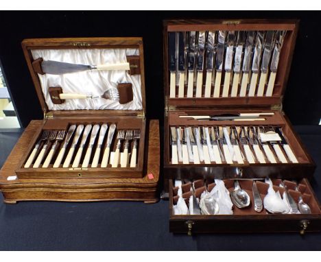 AN OAK-CASED CANTEEN BY ROBERTS & DOREa Mappin and Webb cased set of fish eaters, and another cased part set (3)