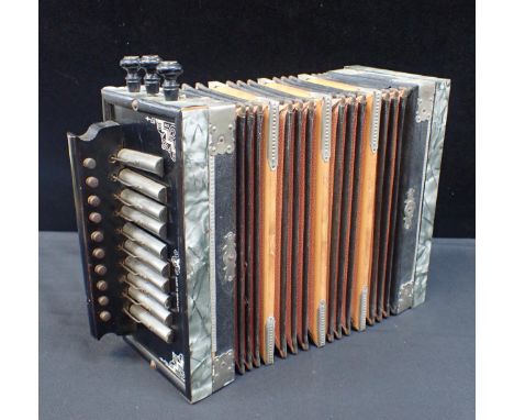 A VINTAGE GERMAN MADE ACCORDION