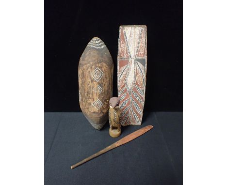 FOUR AUSTRALIAN CARVED AND WOODEN ARTEFACTSA bird, shield, stick and a bark panel (measures 50.5cm x 14cm) (4)