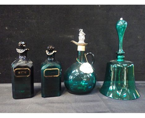 A PAIR OF 'BRISTOL' GREEN GLASS SQUARE RUM DECANTERS(chips) another with silver collar and figural stopper, and a glass bell 