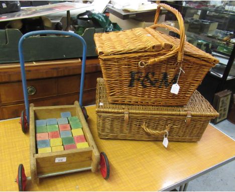 Child's mid 20th Century push-along cart, together with a quantity of wooden building blocks, Fortnum & Mason hamper and anot