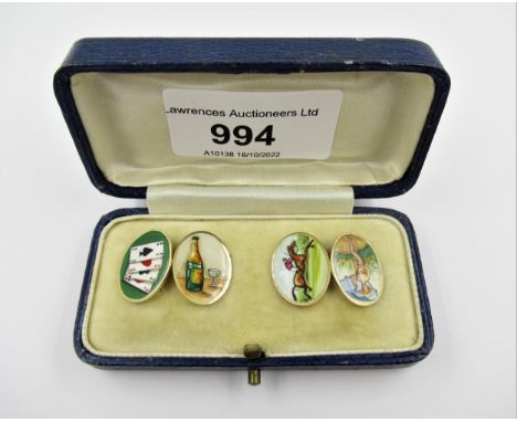 Pair of 18ct Gold and enamel cufflinks, decorated with playing cards, champagne bottle, huntsman on horseback and figure with