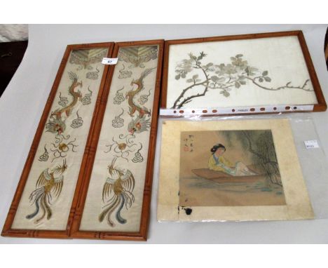Pair of framed Chinese silk and gold thread sleeve panels depicting dragon chasing pearl, together with a similar panel of bl