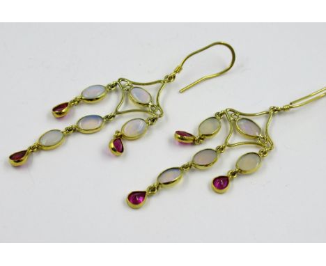 Pair of yellow metal opal and pink ruby set earrings, each of triple drop design, 45mm drop excluding the wire loops 