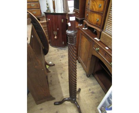 Mahogany bedpost lamp standard, wrought iron lamp standard and an oval bevel edge wall mirror 
