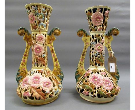 Near pair of large Zsolnay Pecs two handled reticulated baluster form vases, each with typical pierced floral decoration, one