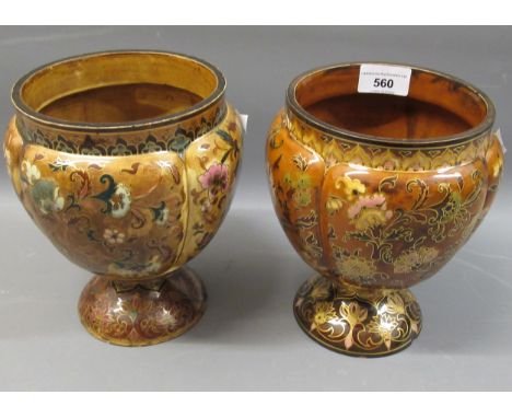 Near pair of Zsolnay Pecs pedestal lobed baluster vases, each with stylised floral decoration in polychrome and gilt on a mot