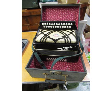 Russian black lacquered accordion in original carry case 