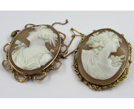 19th Century oval 9ct gold mounted carved shell cameo portrait brooch, the cameo 50mm x 38mm, together with another carved sh