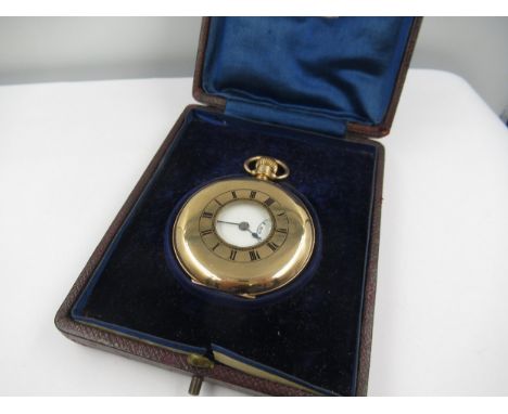 9ct Gold cased half hunter pocket watch, the enamel dial with Roman numerals and subsidiary seconds, the keyless movement by 