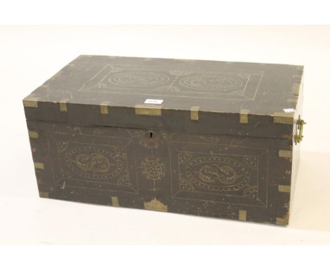 Indian carved hardwood and brass mounted trunk with side carrying handles and fitted interior 