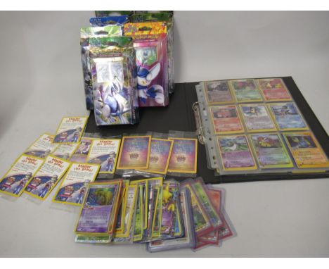 Album containing a set of Pokemon ruby and sapphire gaming cards, together with a quantity of boxed Pokemon Decks and loose c